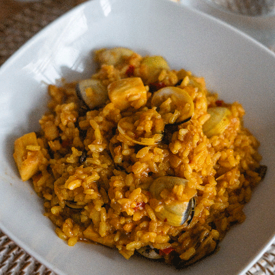 Arroz Meloso con Almejas Mejillones y Merluza
