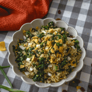 Quinoa con queso blanco y espinacas rehogadas con frutos secos